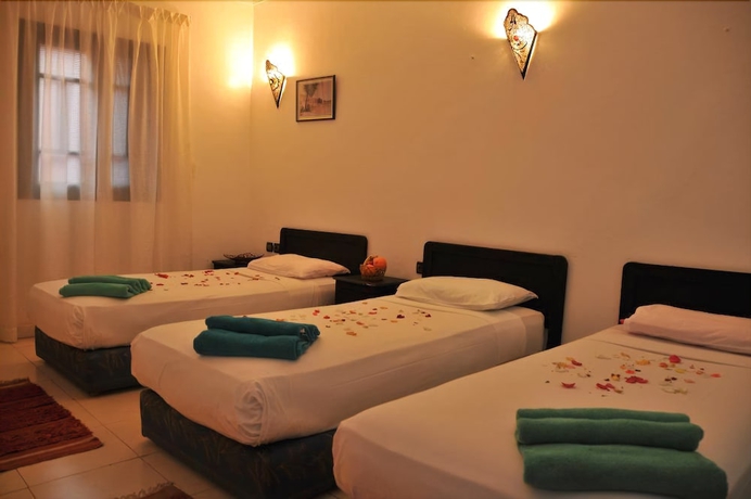 Imagen de la habitación del Hotel Riad El Kennaria. Foto 14