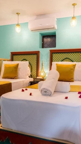 Imagen de la habitación del Hotel Riad Jnane Fes Medina and Luxury Palace. Foto 4
