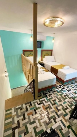 Imagen de la habitación del Hotel Riad Jnane Fes Medina and Luxury Palace. Foto 5