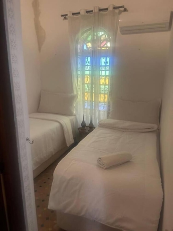 Imagen de la habitación del Hotel Riad Khadija Mille et une Nuit. Foto 10