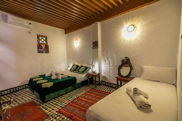 Imagen de la habitación del Hotel Riad fes iline. Foto 5