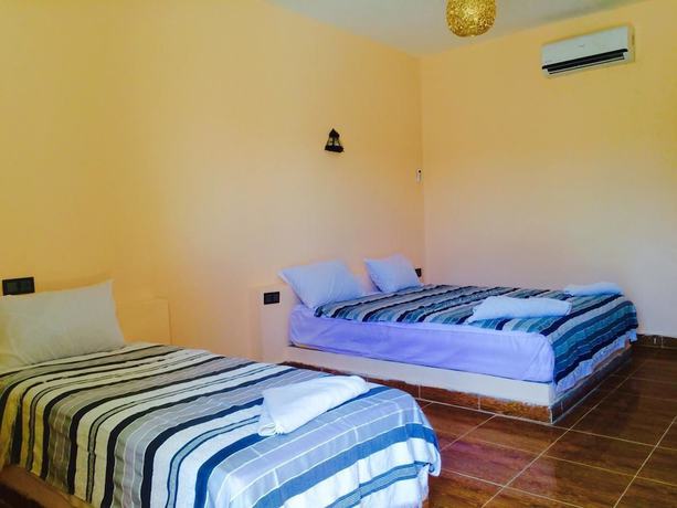 Imagen de la habitación del Hotel Riad les Flamants Roses, Hassilabied. Foto 4