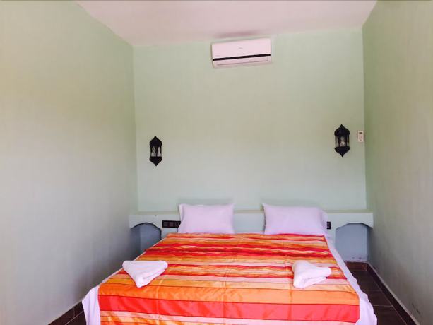 Imagen de la habitación del Hotel Riad les Flamants Roses, Hassilabied. Foto 9