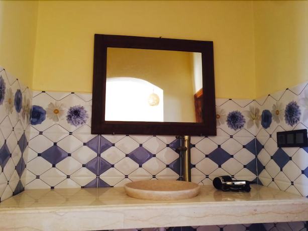 Imagen de la habitación del Hotel Riad les Flamants Roses, Hassilabied. Foto 11