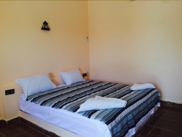 Imagen de la habitación del Hotel Riad les Flamants Roses, Hassilabied. Foto 14
