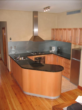 Imagen de la habitación del Hotel Rialto Apartments. Foto 4
