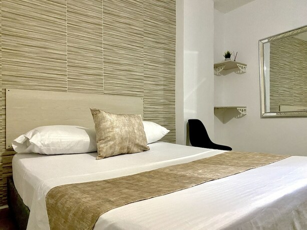 Imagen de la habitación del Hotel Rialto DMar. Foto 19