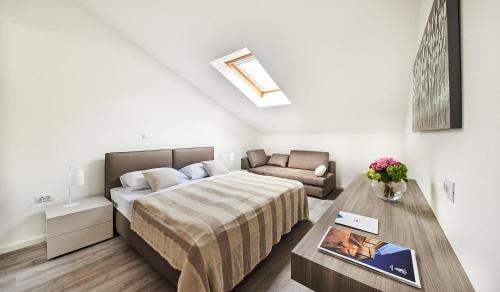 Imagen de la habitación del Hotel Ribarska Koliba Resort. Foto 8