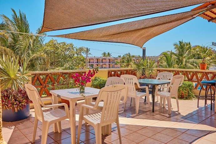 Imagen de la habitación del Hotel Ricardos Bungalows. Foto 3
