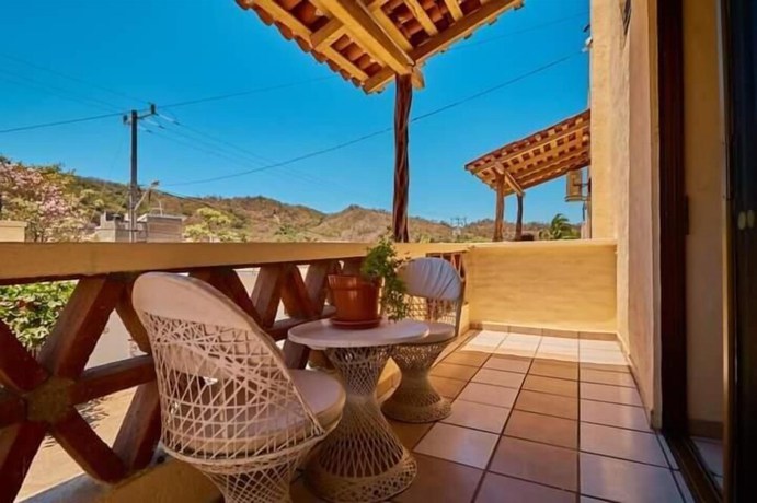 Imagen de la habitación del Hotel Ricardos Bungalows. Foto 4