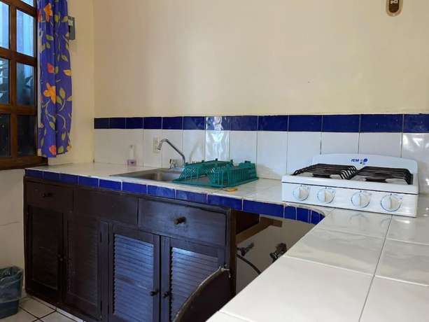 Imagen de la habitación del Hotel Ricardos Bungalows. Foto 11