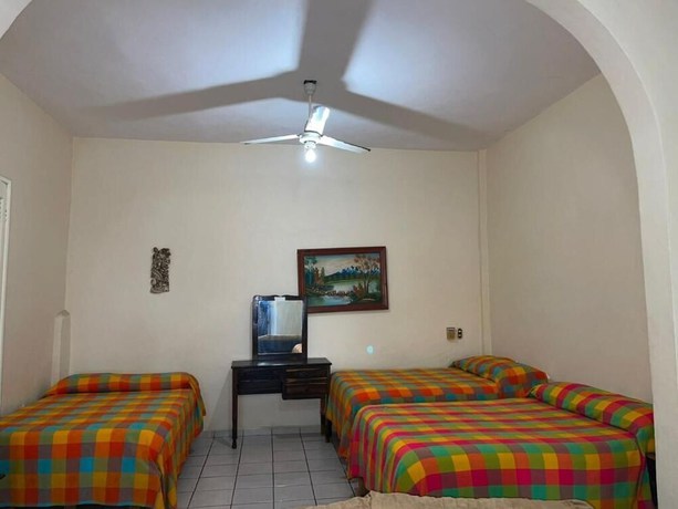 Imagen de la habitación del Hotel Ricardos Bungalows. Foto 15