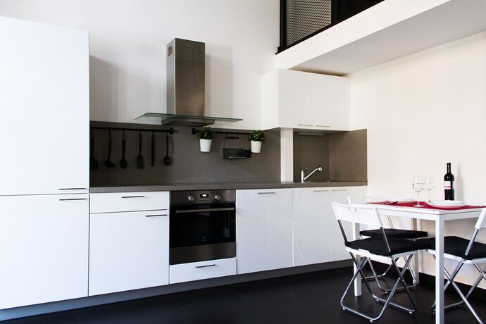 Imagen de la habitación del Hotel Ricci Apartments. Foto 16