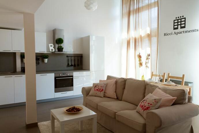 Imagen de la habitación del Hotel Ricci Apartments. Foto 17