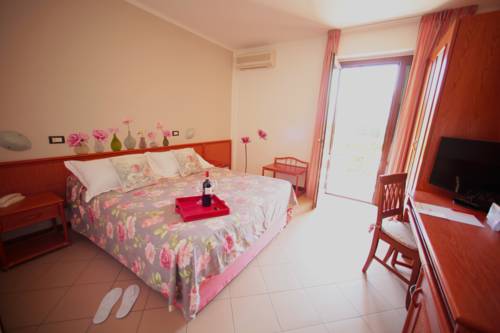 Imagen de la habitación del Hotel Ricci, Marina di Grosseto. Foto 12