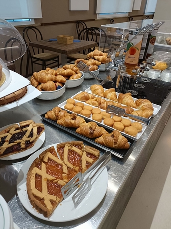 Imagen del bar/restaurante del Hotel Ricci, Rimini. Foto 4
