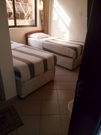 Imagen de la habitación del Hotel Rich, ARUSHA. Foto 14