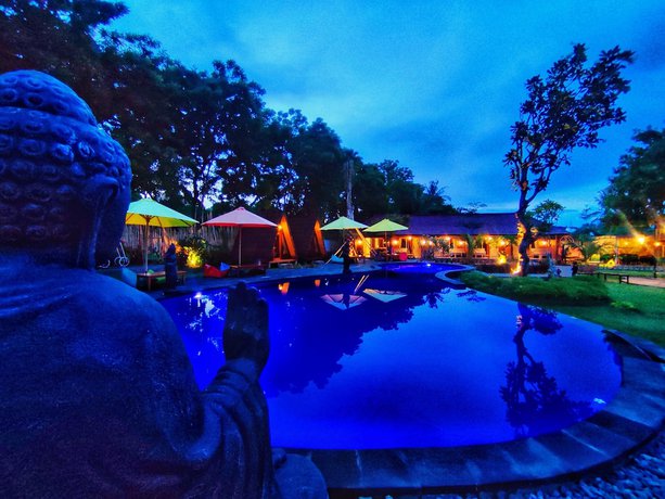 Imagen de la piscina del Hotel Rich Farmer Eco House and Yoga. Foto 19