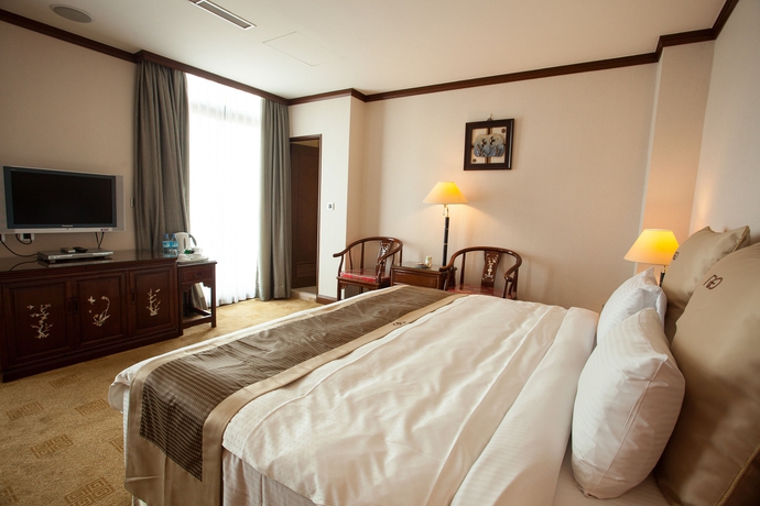 Imagen de la habitación del Hotel Rich Garden. Foto 2