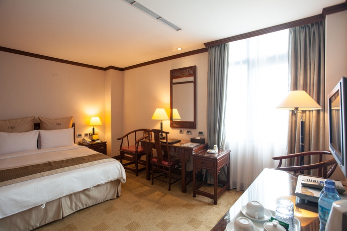 Imagen de la habitación del Hotel Rich Garden. Foto 6
