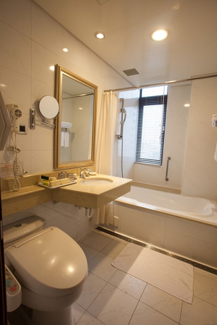 Imagen de la habitación del Hotel Rich Garden. Foto 7