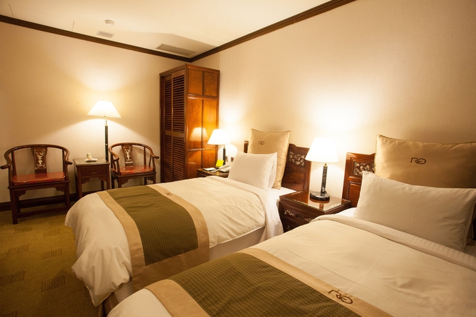 Imagen de la habitación del Hotel Rich Garden. Foto 9