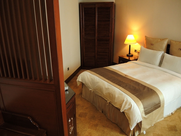 Imagen de la habitación del Hotel Rich Garden. Foto 11