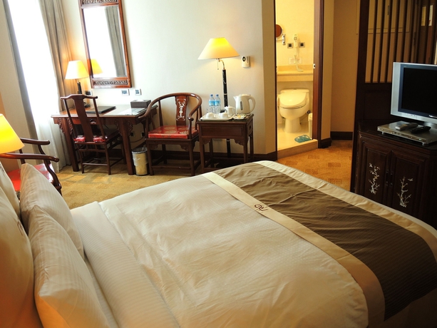Imagen de la habitación del Hotel Rich Garden. Foto 15