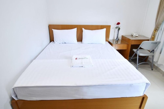 Imagen de la habitación del Hotel Rich Guesthouse. Foto 3