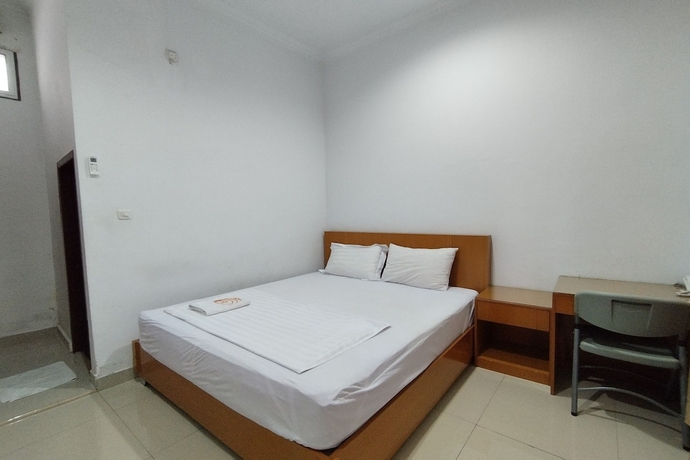 Imagen de la habitación del Hotel Rich Guesthouse. Foto 6