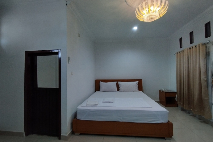 Imagen de la habitación del Hotel Rich Guesthouse. Foto 8