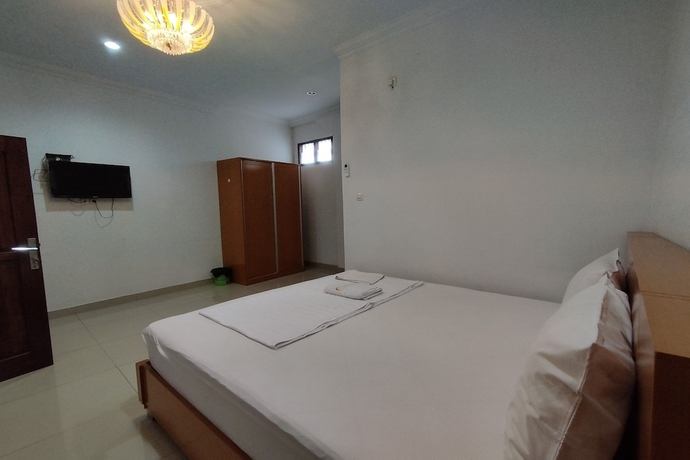Imagen de la habitación del Hotel Rich Guesthouse. Foto 11
