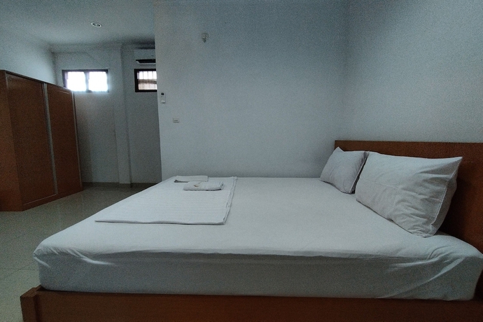 Imagen de la habitación del Hotel Rich Guesthouse. Foto 12