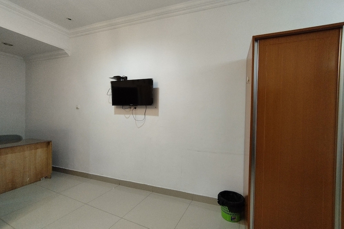 Imagen de la habitación del Hotel Rich Guesthouse. Foto 13
