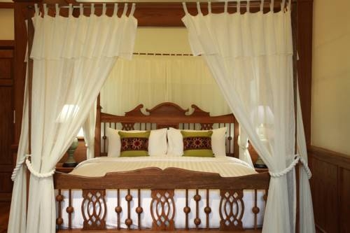 Imagen de la habitación del Hotel Rich Lanna House, Chiang Mai. Foto 39