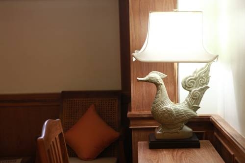 Imagen de la habitación del Hotel Rich Lanna House, Chiang Mai. Foto 40