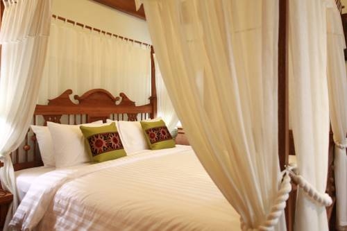Imagen de la habitación del Hotel Rich Lanna House, Chiang Mai. Foto 41