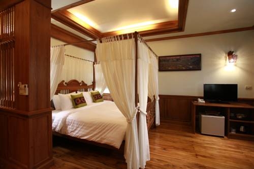 Imagen de la habitación del Hotel Rich Lanna House, Chiang Mai. Foto 42