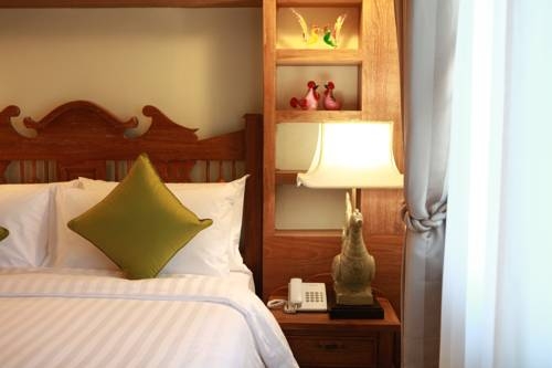 Imagen de la habitación del Hotel Rich Lanna House, Chiang Mai. Foto 43