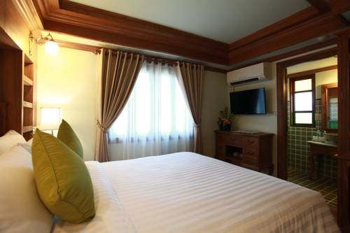 Imagen de la habitación del Hotel Rich Lanna House, Chiang Mai. Foto 44
