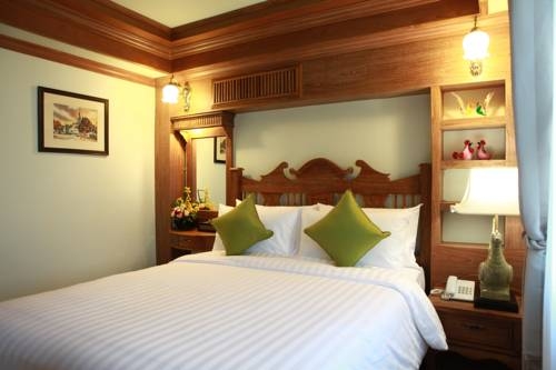 Imagen de la habitación del Hotel Rich Lanna House, Chiang Mai. Foto 45