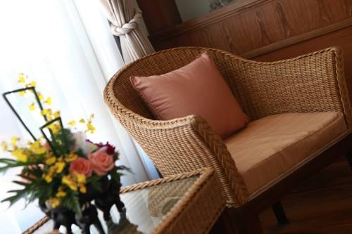 Imagen de la habitación del Hotel Rich Lanna House, Chiang Mai. Foto 46