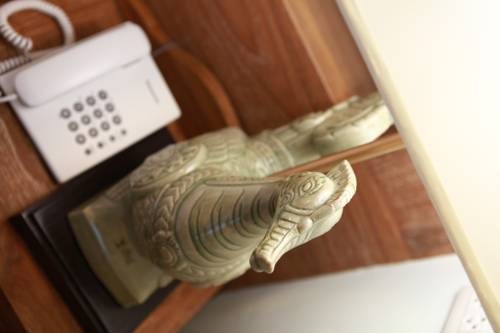 Imagen de la habitación del Hotel Rich Lanna House, Chiang Mai. Foto 47
