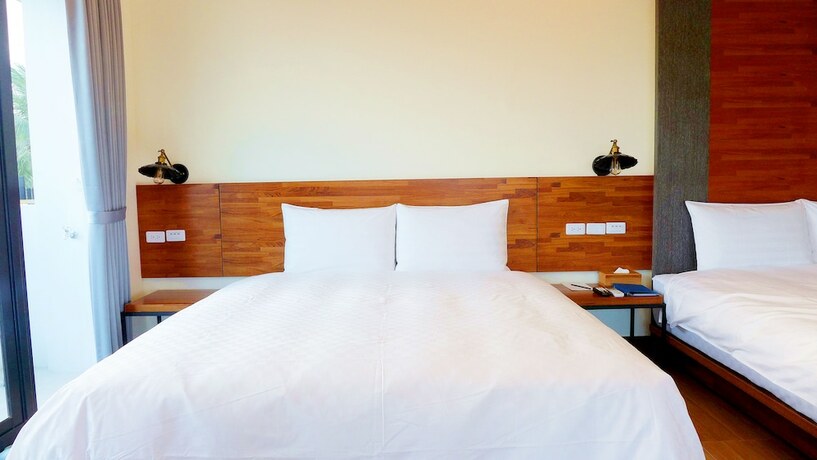 Imagen de la habitación del Hotel Rich Sunshine Inn. Foto 12