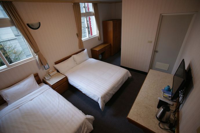 Imagen de la habitación del Hotel Rich Zone Hotel. Foto 3