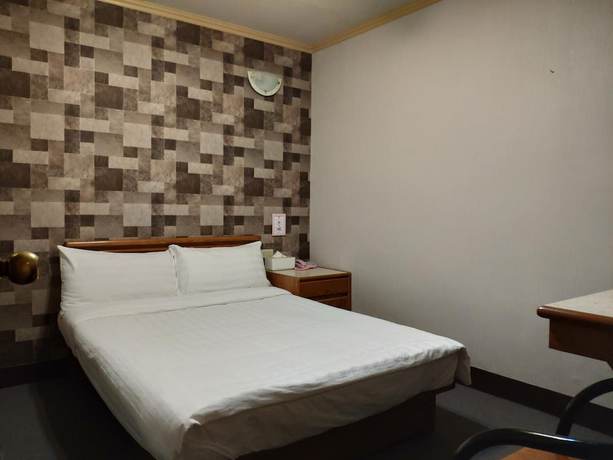 Imagen de la habitación del Hotel Rich Zone Hotel. Foto 4