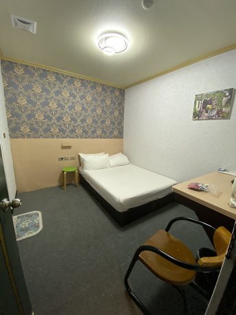 Imagen de la habitación del Hotel Rich Zone Hotel. Foto 6
