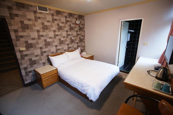 Imagen de la habitación del Hotel Rich Zone Hotel. Foto 8