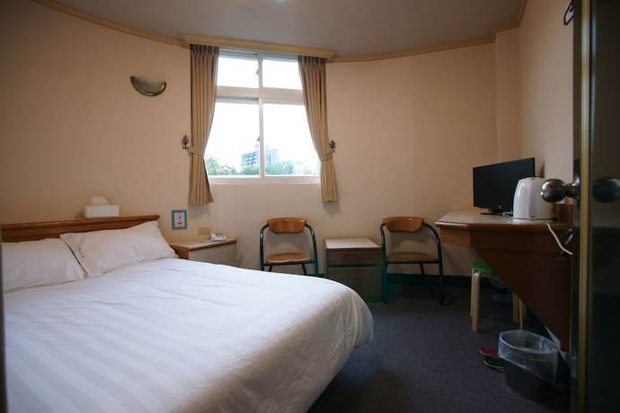 Imagen de la habitación del Hotel Rich Zone Hotel. Foto 9