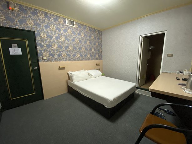 Imagen de la habitación del Hotel Rich Zone Hotel. Foto 10